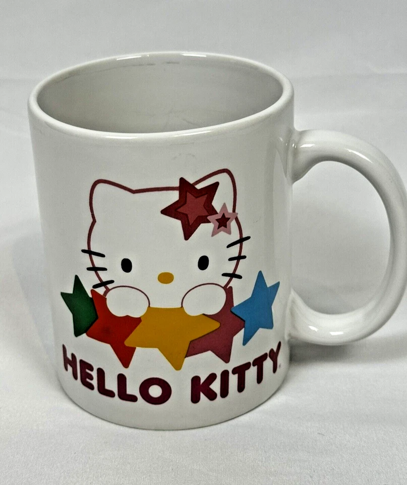 Taza Hello Kitty Árbol de Navidad Estrellas Blanco Cerámica Colorido Gráfico 12 OZ Usada en Excelente Condición Foto 2 de 4