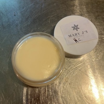 Mary J's Naturals leave in hair conditioner in Jar.