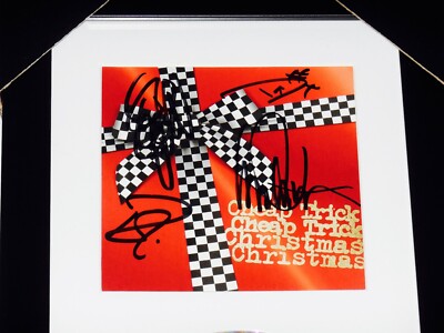 CHEAP TRICK AUTOGRAPHED CHRISTMAS CD COVER (FRAMED & MATTED) - W 