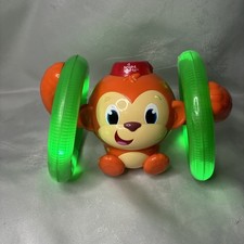 Bright Starts Roll Glow Monkey Toy with Lights and Melodies, Ages 6 months