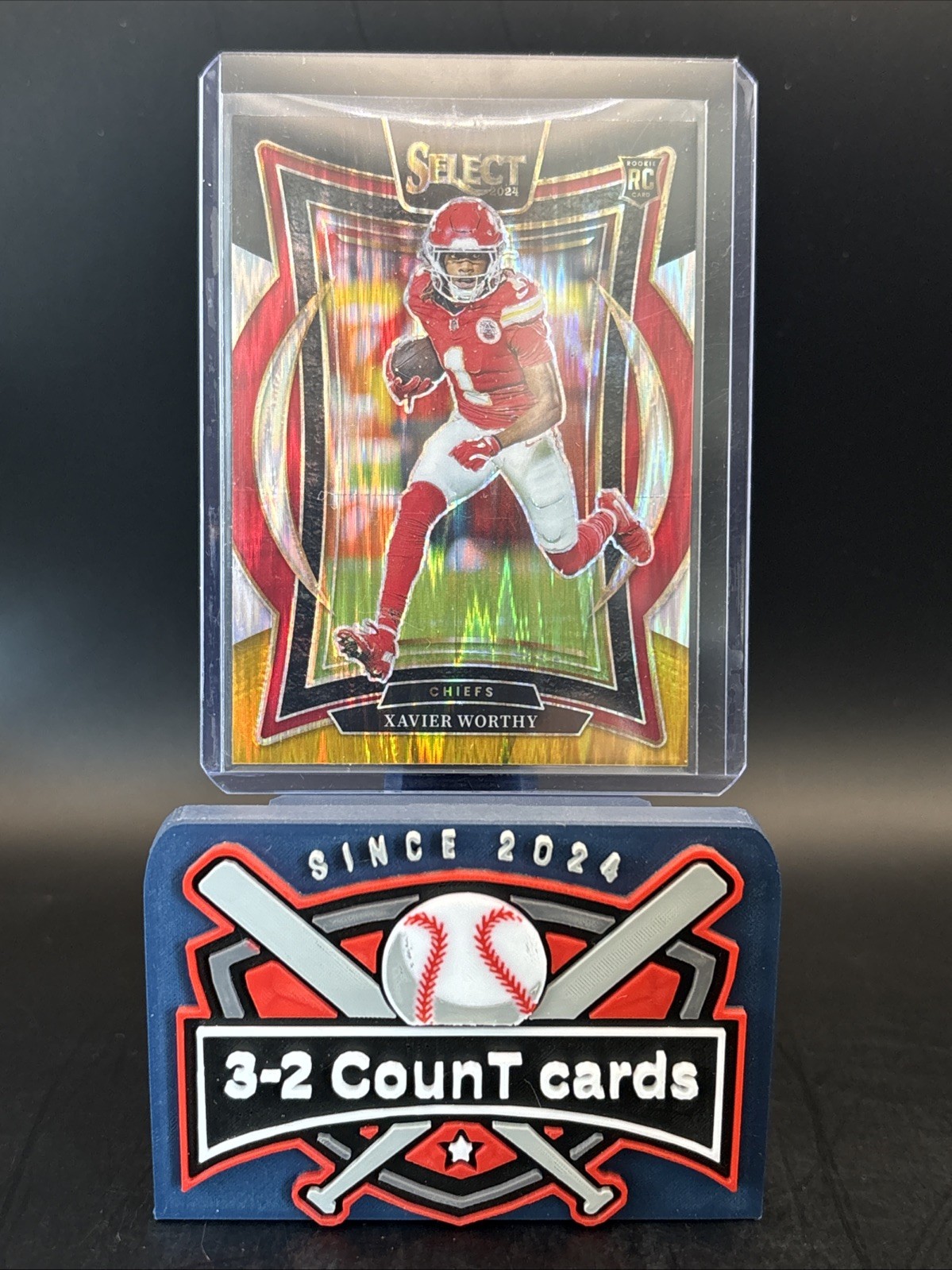 2024 Panini Select - Concourse Xavier Worthy #32 Black & Gold Shock Prizm (RC)