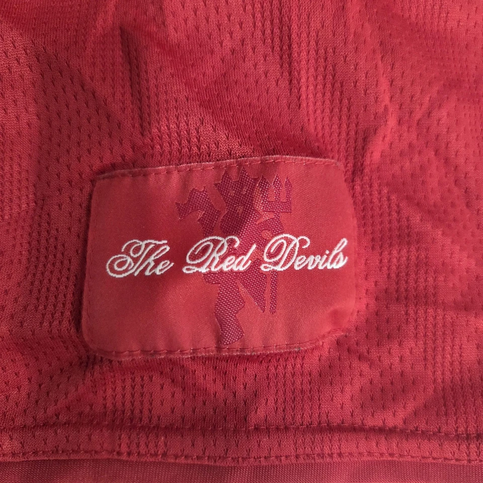 Camiseta de fútbol roja XL del Manchester United para hombre AIG NikeFIT seca Nike Foto 2 de 4