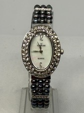 Croton Women Silver Oval Crystal Pav Bezel MOP Dial Black Pearl Bracelet Watch