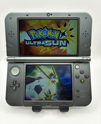 Nintendo New 3DS XL Console w/ AC Adapter Pokemon Ultra Sun & Super Smash Bros