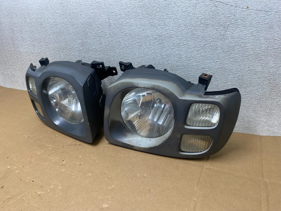 Faros laterales izquierdo+derecho Nissan Xterra 2002 2003 2004 OEM V4819 DW Foto 2 de 4