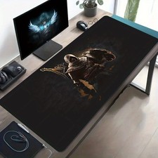A Large Gaming Mouse Pad Featuring a Design of an Ancient Egyptian Warrior And