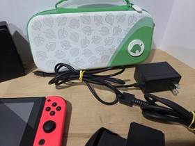 Nintendo Switch Neon Blue/Neon Red Bundle w/ Dock, AC Adapter, Case 128gb Card 
