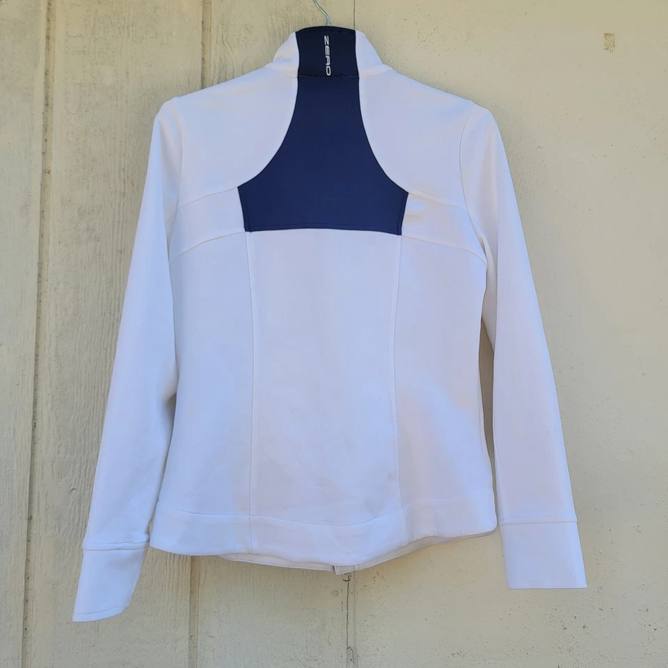 Chaqueta de golf Zero Restriction para mujer talla mediana blanca/azul logotipo cremallera completa Foto 3 de 4