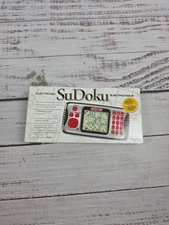 NIB EXCALIBUR ELECTRONIC SUDOKU 16K PUZZLES, 4 LEVELS, HANDHELD PORTABLE GAME.