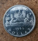 1965 uncirculated Canadian 80% silver dollar