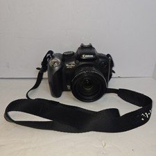 Canon PowerShot SX10 IS 10MP Digital Camera 2...