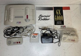 Amstrad GX 4000 Games Console,  Controllers & Burnin Rubber Boxed Working