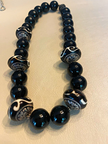 The included paper tag identifies this piece as artisan jewelry from Mon Bijoux