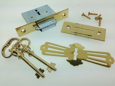 Roll-top Desk or Chest lock with self closing strike hardware 
