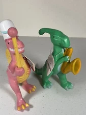 ANKYO Lot Of 2 Marching Band Dinosaurs Plastic Toy Figures Drum Sax Drum Tags