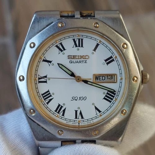 Vintage SEIKO SQ-100 WHITE DIAL Quartz Movement With Day-Date Ref 5Y23-8200 38MM