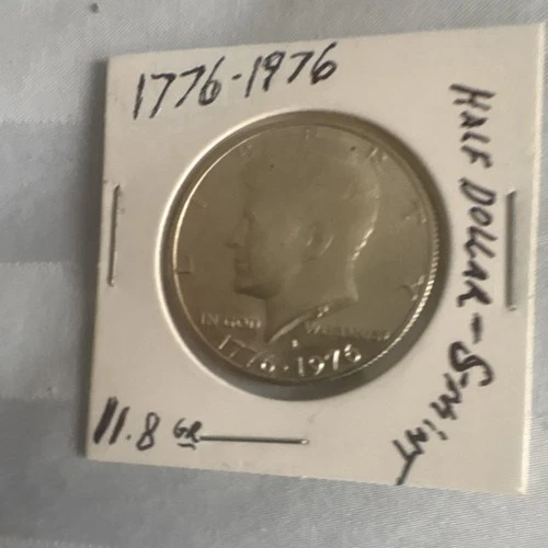 U.S. Mint 1999 American Eagle 1 oz Silver & 1976 Kennedy Half Dollar 11.8g Coins