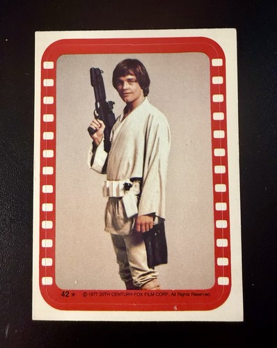 1977 Topps Star Wars Stickers #42 Luke poses with his weapon — TAG (grade unconfirmed)