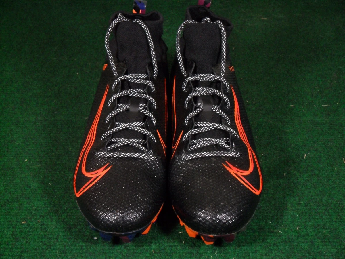 orange and black nike football cleats