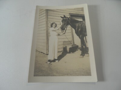 E2-17 Estate photo 1940 Gordon Lake woman showing  horse