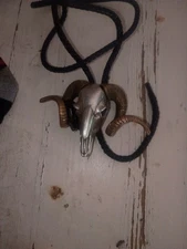 A Silver And Brass Ram