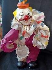 Vintage Wind-Up Musical Clown Figurine. Moves and plays music when wound