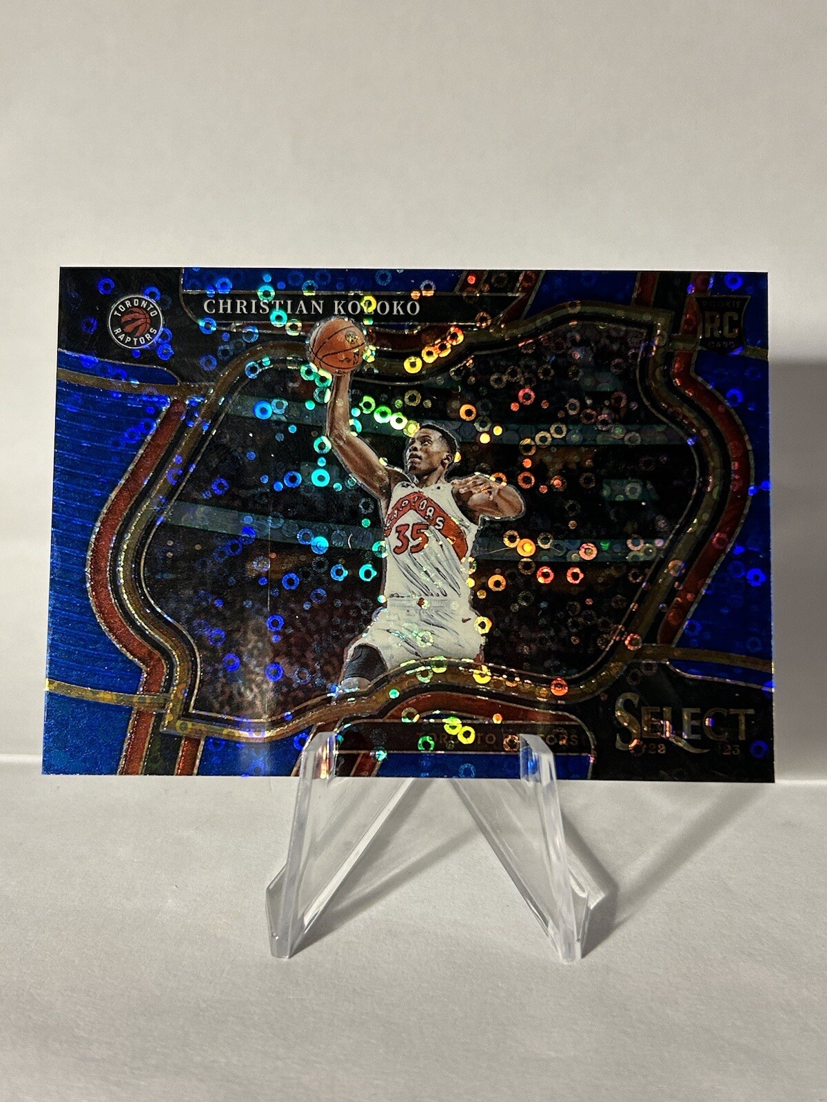 2022-23 Panini Select Christian Koloko Courtside Blue Disco Prizm RC Rookie /25