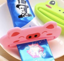 Toothpaste Tube Squeezer Pig Easy Dispenser Plastic Rolling Holder Bathroom US