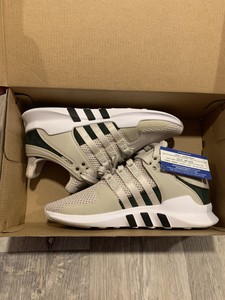 tan and white adidas