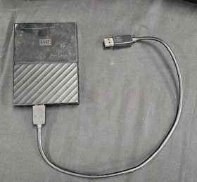 Microsoft Xbox One X with 1 controller, 4TB External Hard Drive, & 9 Games