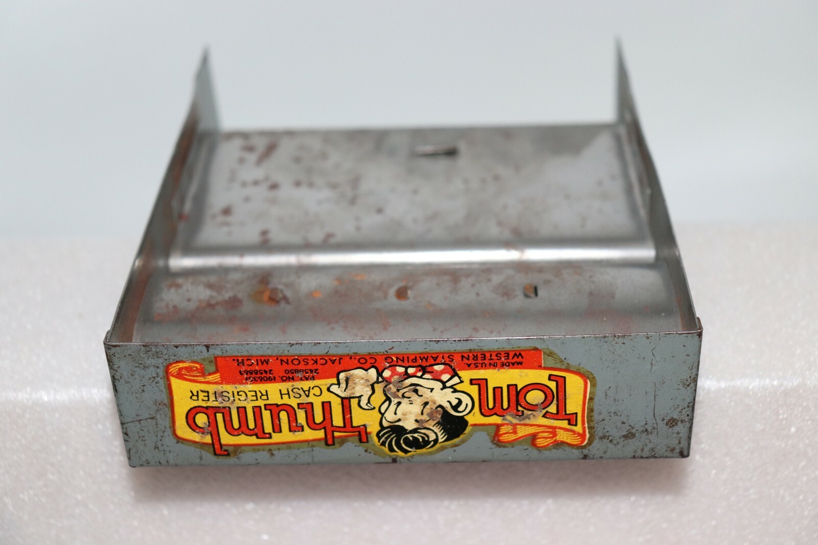 как выглядит Vintage Metal Tom Thumb Cash Register Change Box Only Western Stamping Company фото
