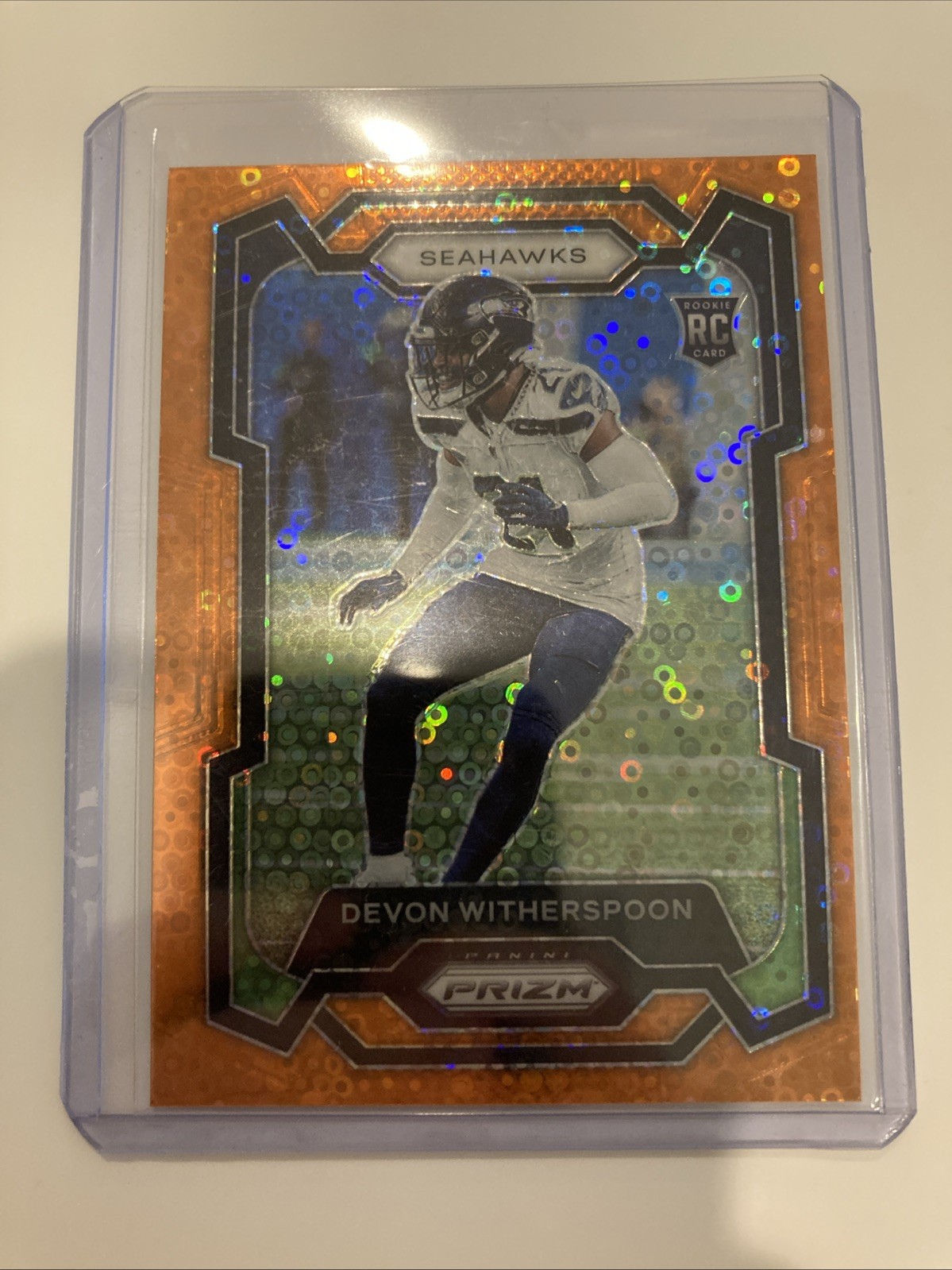 2023 Panini Prizm - DEVON WITHERSPOON - Orange Disco Rookie RC #389 - Seahawks