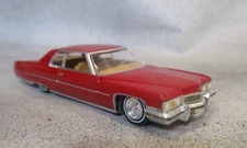 Greenlight 1973 Cadillac Coupe DeVille in Medium Red  1:64 Diecast Rubber Tires