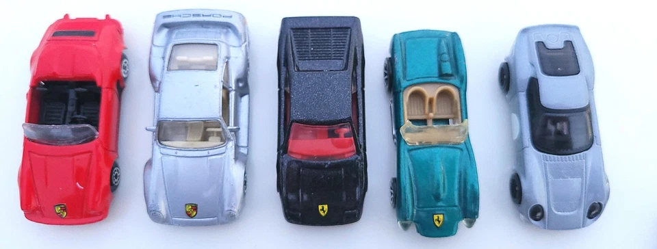 Lote de 5 autos deportivos diecast - Hot Wheels Ferrari, Maisto Porsche 1989 Foto 3 de 4