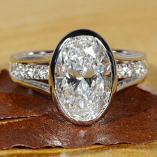4.78 TCW Oval Cut Moissanite Bezel Engagement Ring 14K White Gold Plated