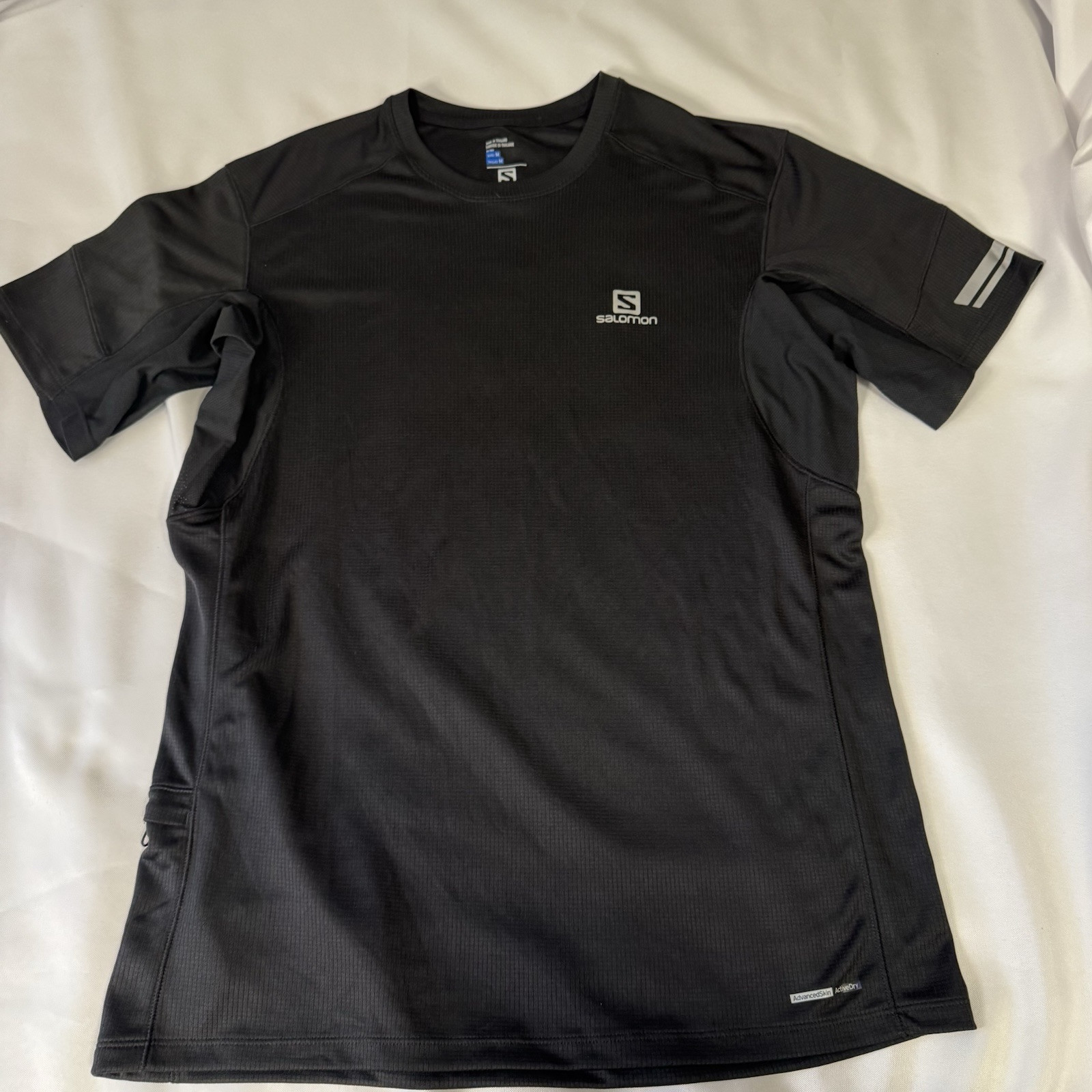 Camicia Salomon nera media manica corta performance