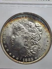 1885 $1 Morgan Dollar ANACS MS63 Soapbox Toned #PK6902