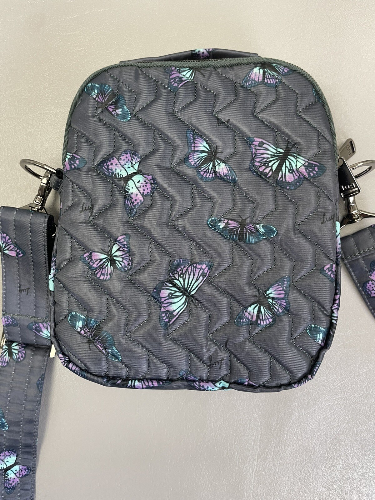 Lug RFID Skeeter Crossbody Bag With Charm Bar Butterfly Grey eBay