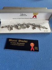 Marcel Drucker Ladies Sliver Tone Charm Watch