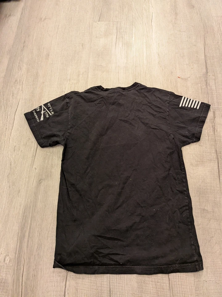 Camiseta Grunt Style This We'll Defend Flag 2.0 - Talla Pequeña  Foto 3 de 4