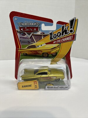 Disney Pixar Cars Gold Ramone Impala #12 Lenticular Eyes that Change 2009 NEW