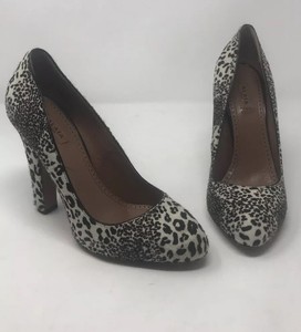 white leopard pumps