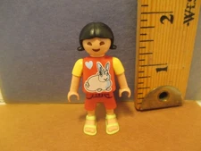 Playmobil figure MODERN GIRL W/ BLACK HAIR IN PINK SHIRT W/ IMAGE OF BUNNY