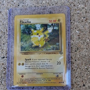 pikachu pokemon card value 60 hp Jungle Common #60 [Lightly Played] choose 1 of them and this attack does 10 damage to it pikachu pokemon cards worth money