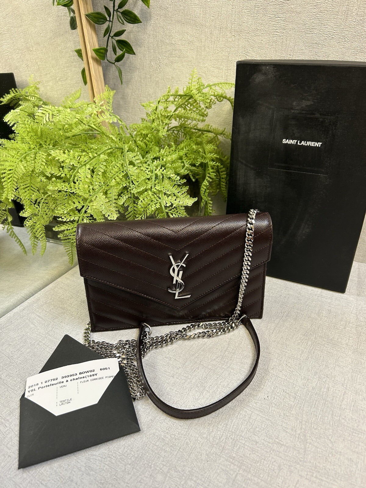 SAINT LAURENT Borsa YSL Cassandra Matelasse nera con patta a tulipano catena WOC
