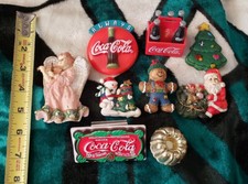 7 fridge magnets - mostly Coca-Cola - 4 ceramic 5 plastic.