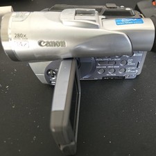 Canon Elura 60 Mini DV Camcorder For Parts never tested No Ac Cord has battery