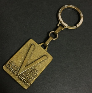 Louis Vuitton Malletier Gold Tone Key Ring Bag Charm LV Voyagez Valises