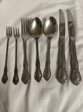 7 piece Spoons Distinction Deluxe by Oneida HH stainless steel flatware