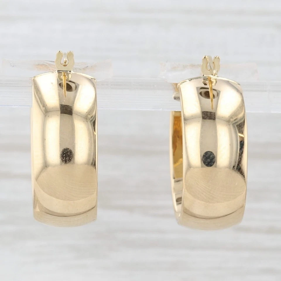 Pendientes de aro de oro amarillo de 18 k con tapa a presión ovalada Foto 2 de 4